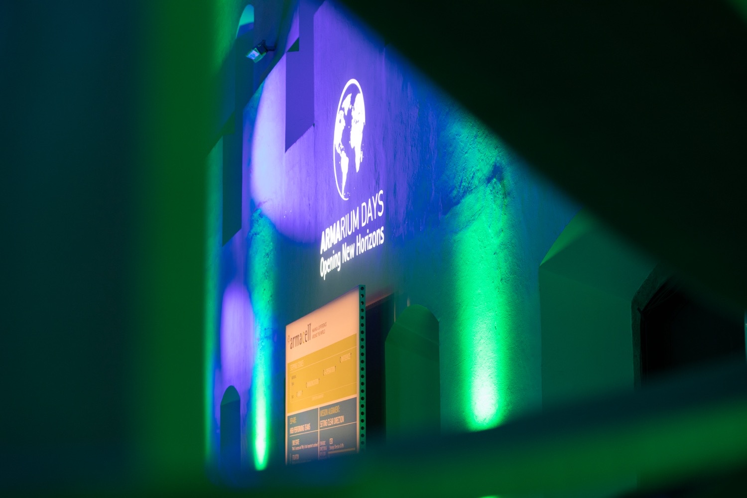 Armacell Armarium Days logo projected onto the wall in the event room An atmospheric snapshot of the Armacell Armarium Days, featuring a logo wall projection and high-quality event staging.